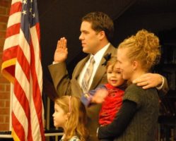 Jon being sworn in to serve the public on the Board of Education.
