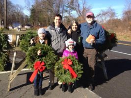 Selling Exchange Club wreaths for the prevention of child abuse.